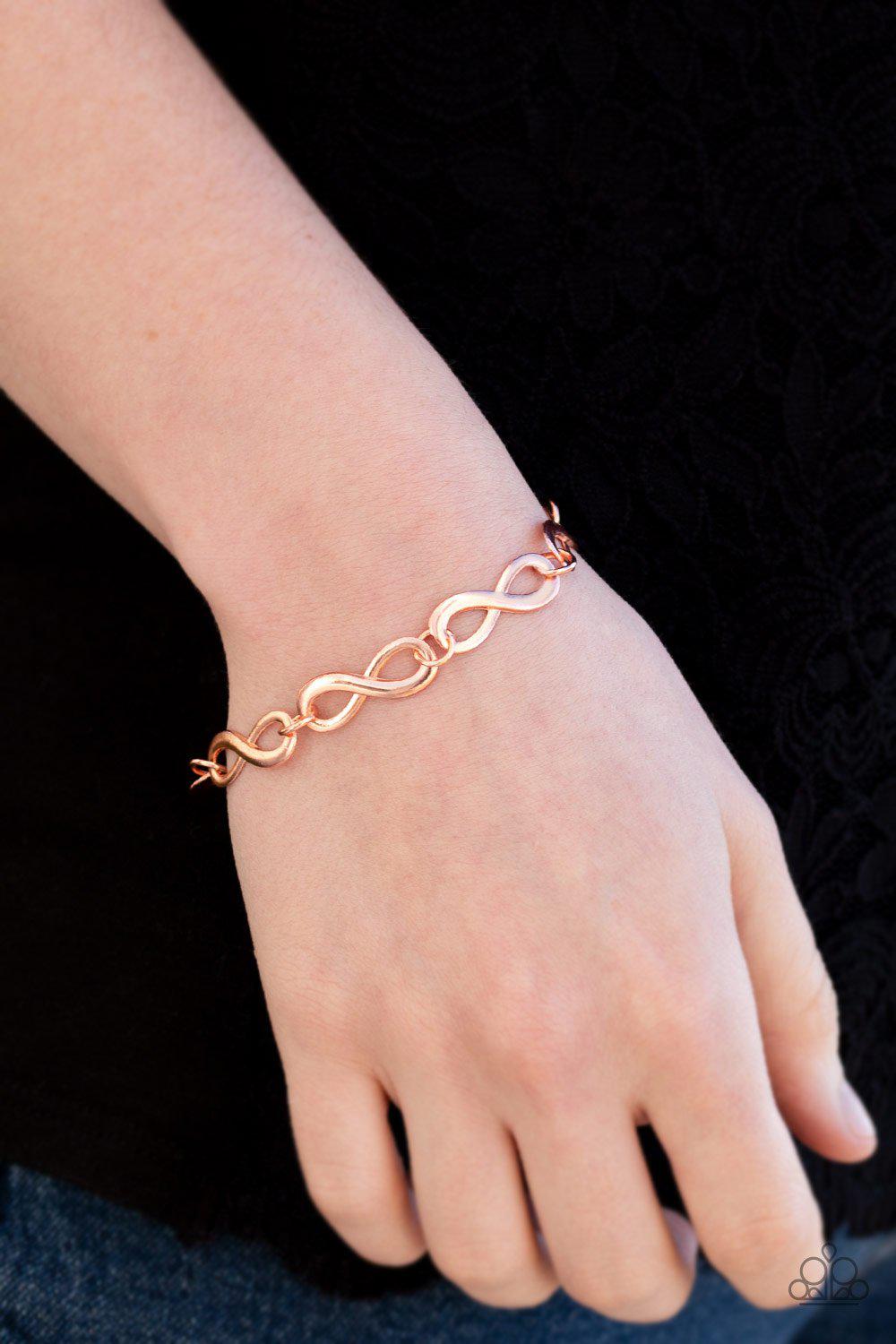 Give Me Time Copper Infinity Bracelet - Paparazzi Accessories- on model - CarasShop.com - Paparazzi Jewelry by Cara Jewels