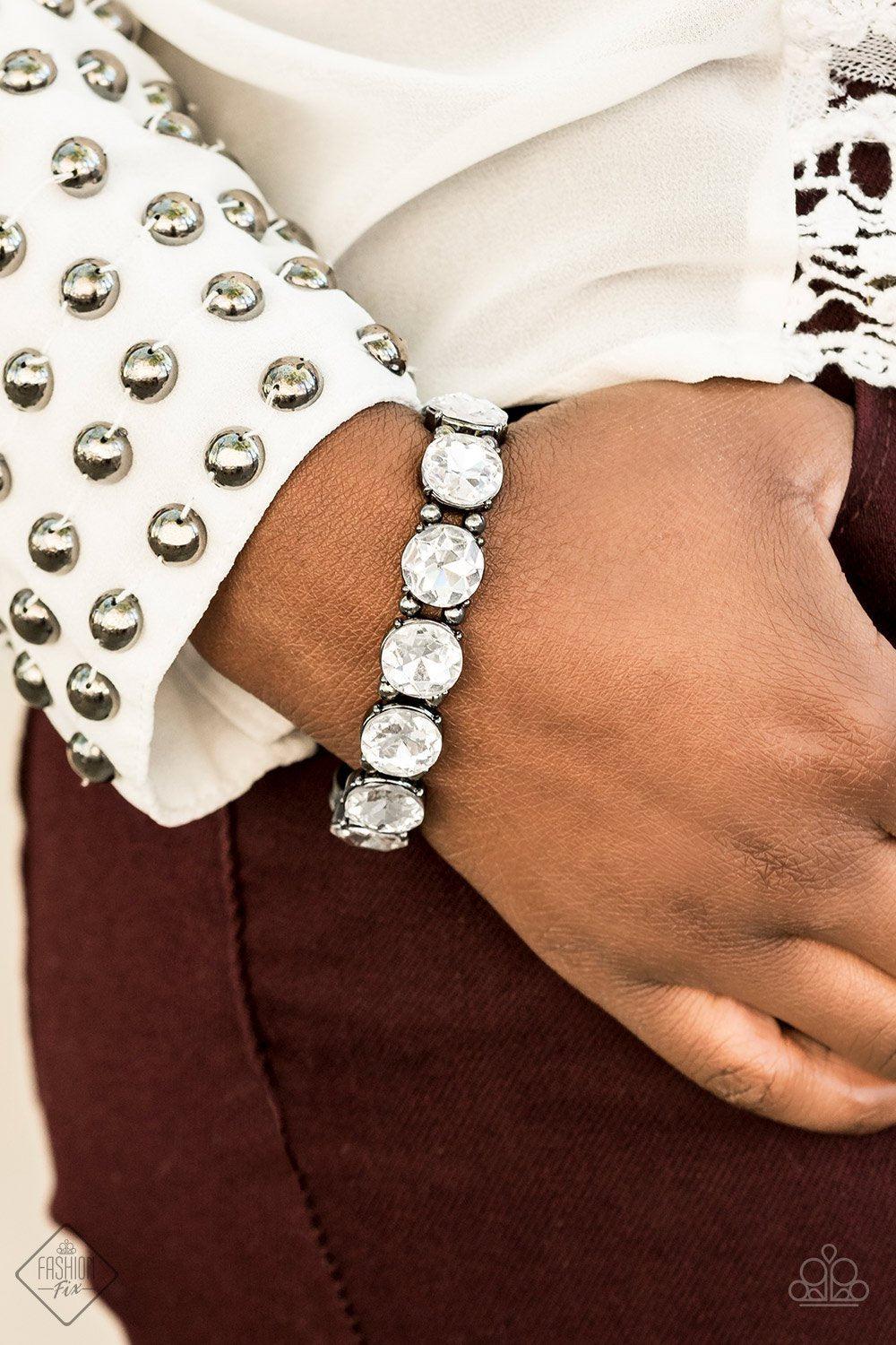 Glitzy Glamorous Gunmetal and White Rhinestone Bracelet - Paparazzi Accessories- Complete Look - CarasShop.com - Paparazzi Jewelry by Cara Jewels