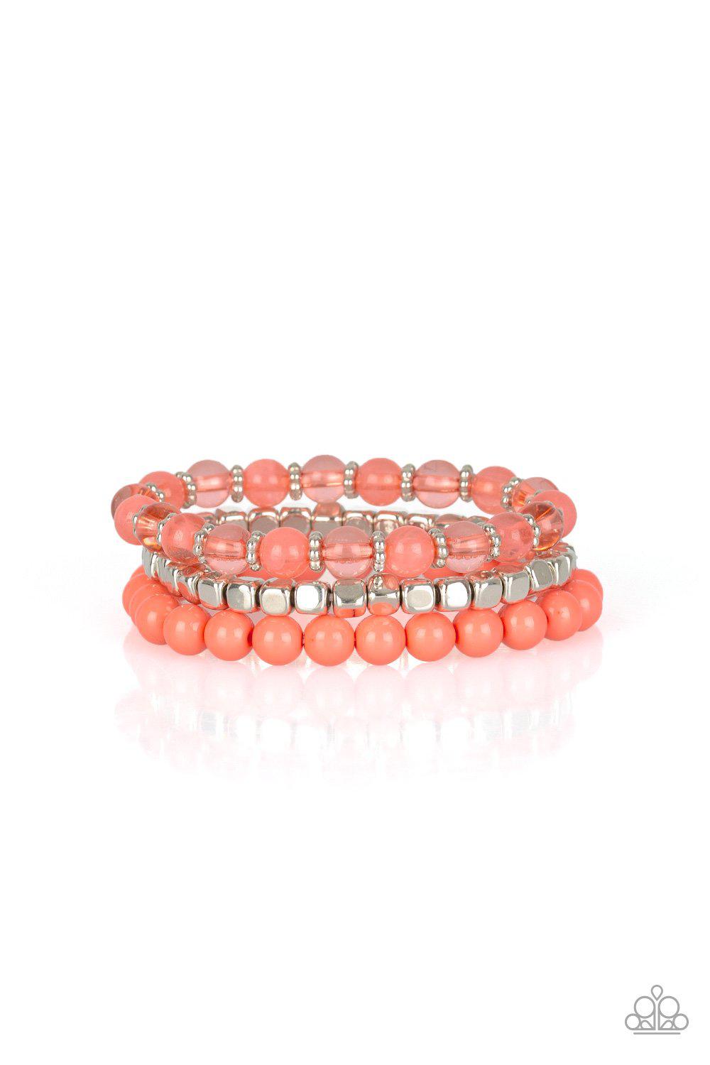 Globetrotter Glam Silver and Coral Bracelet Set - Paparazzi Accessories- on model - CarasShop.com - Paparazzi Jewelry by Cara Jewels