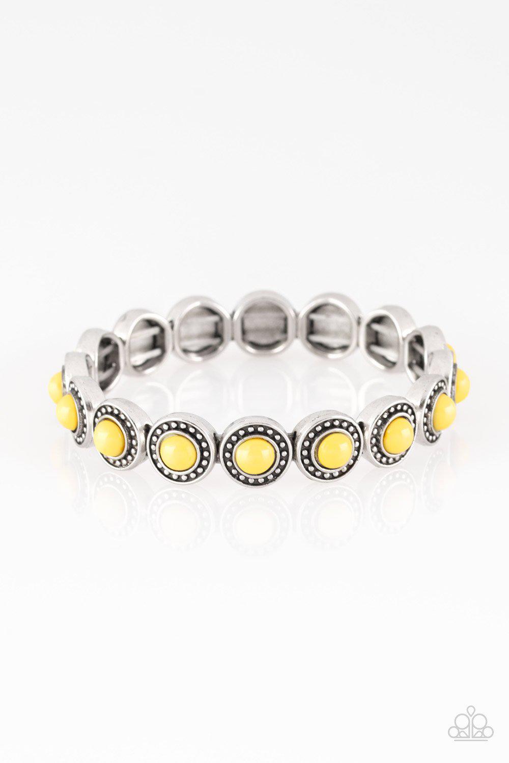 Globetrotter Goals Yellow Bracelet - Paparazzi Accessories- on model - CarasShop.com - Paparazzi Jewelry by Cara Jewels