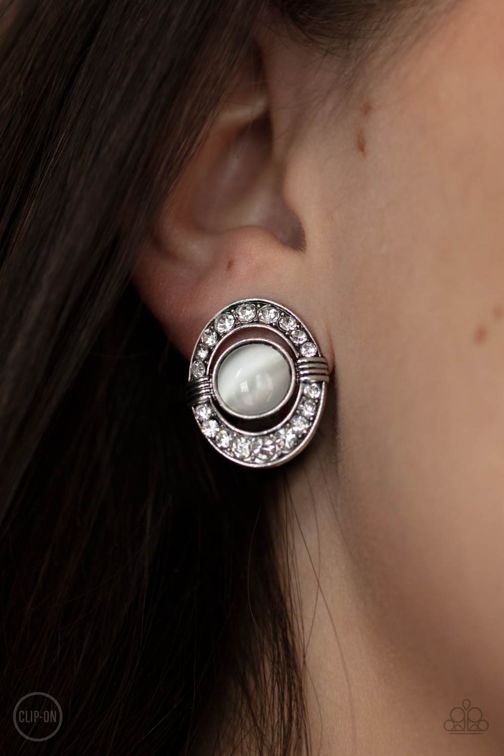 GLOW of Force White Cat's Eye and Rhinestone Clip-on Earrings - Paparazzi Accessories- lightbox - CarasShop.com - Paparazzi Jewelry by Cara Jewels
