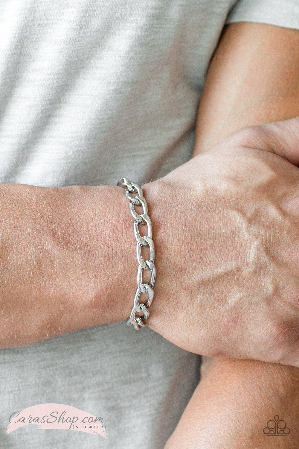 Goalpost Men's Silver Chain Knot Bracelet - Paparazzi Accessories- on model - CarasShop.com - Paparazzi Jewelry by Cara Jewels