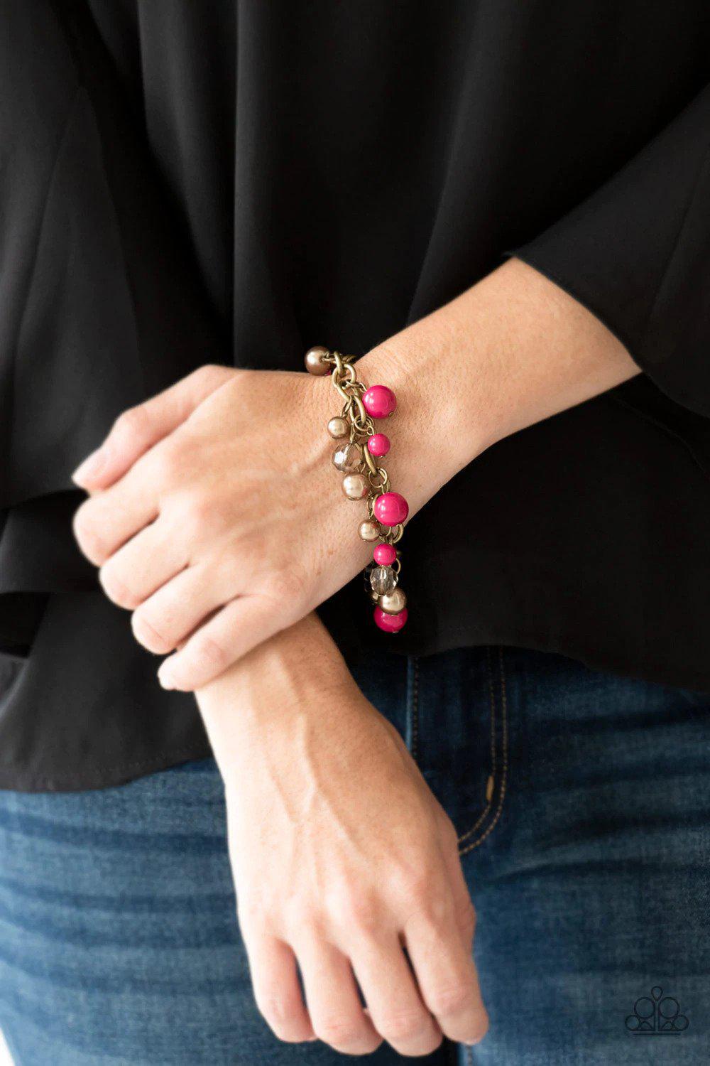 Grit and Glamour Pink and Brass Bracelet - Paparazzi Accessories- on model - CarasShop.com - Paparazzi Jewelry by Cara Jewels