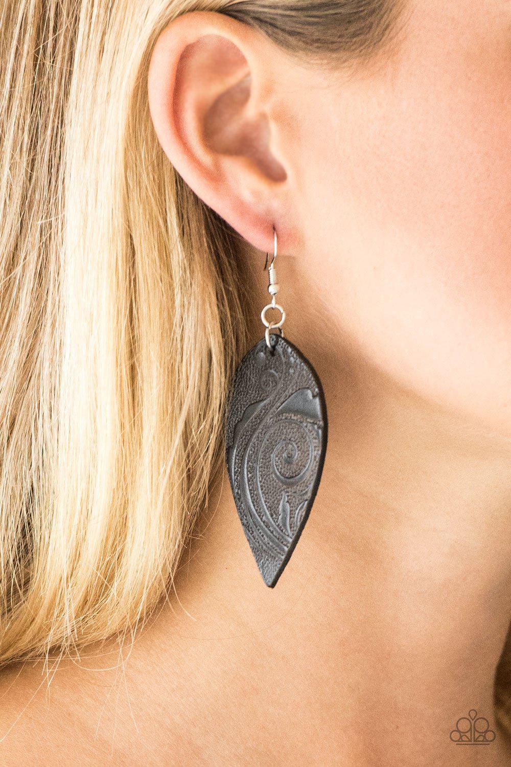 Groovy Grove Black Leather Earrings - Paparazzi Accessories- on model - CarasShop.com - Paparazzi Jewelry by Cara Jewels