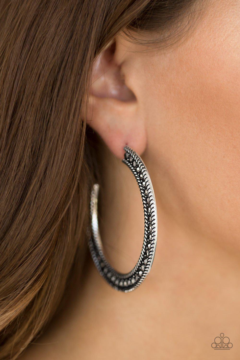 HAUTE Mama Silver and Hematite Rhinestone Hoop Earrings - Paparazzi Accessories- on model - CarasShop.com - Paparazzi Jewelry by Cara Jewels
