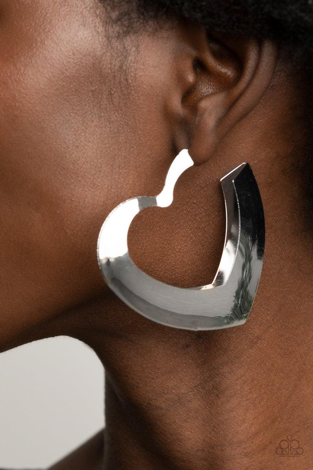 Heart-Racing Radiance Heart-shaped Hoop Earrings - Paparazzi Accessories- lightbox - CarasShop.com - Paparazzi Jewelry by Cara Jewels