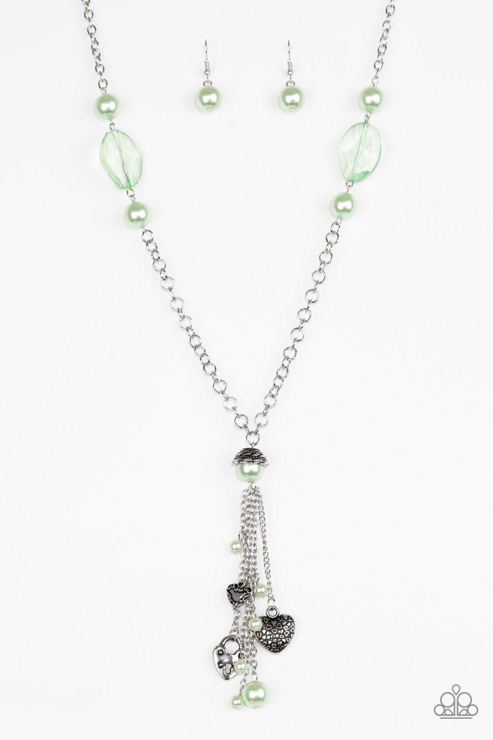 Heart-Stopping Harmony Green Charm Tassel Necklace and Earrings - Paparazzi Accessories- on model - CarasShop.com - Paparazzi Jewelry by Cara Jewels