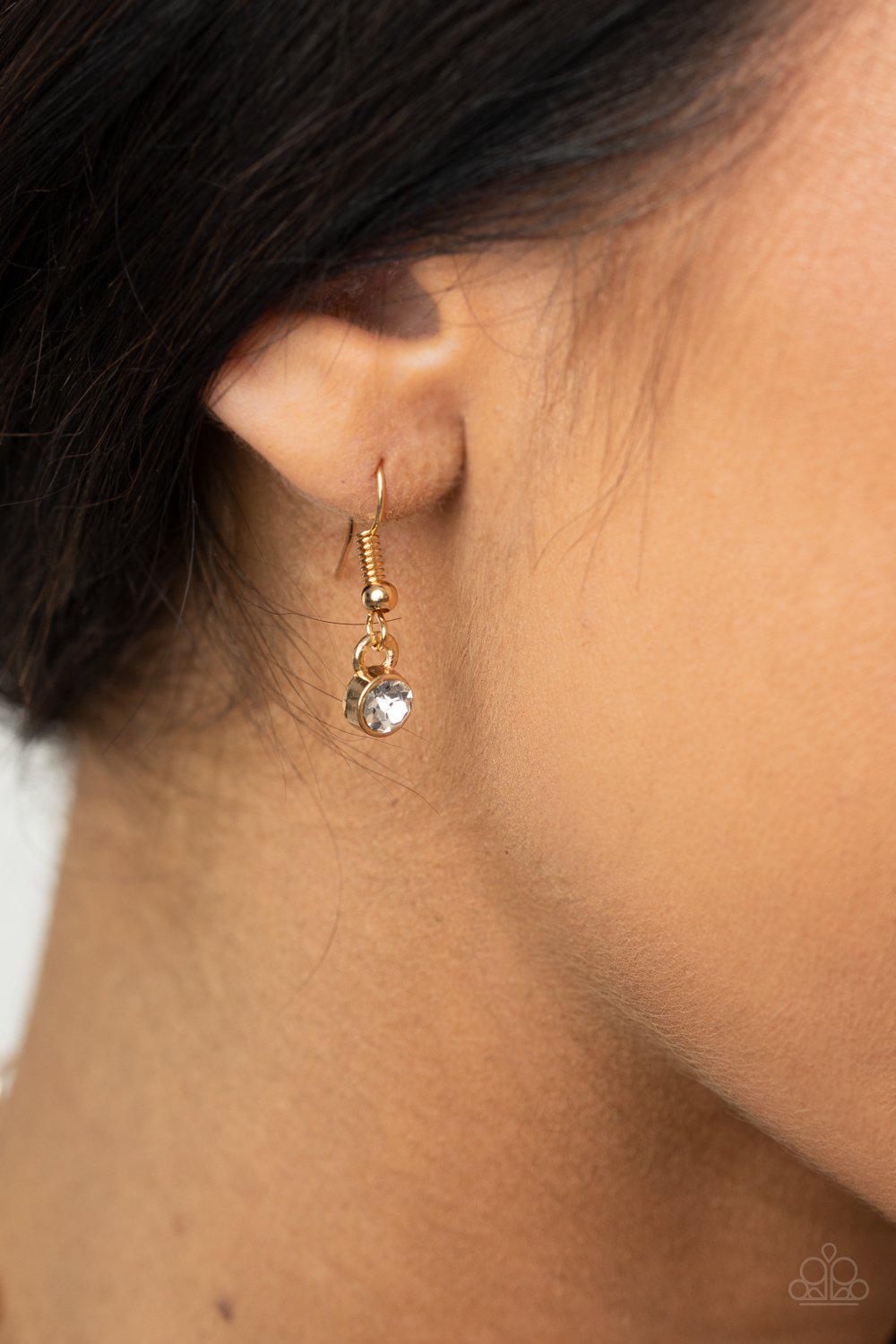 Heart-Stopping Sparkle Gold and White Rhinestone Heart Necklace - Paparazzi Accessories - free matching earrings -CarasShop.com - Paparazzi Jewelry by Cara Jewels