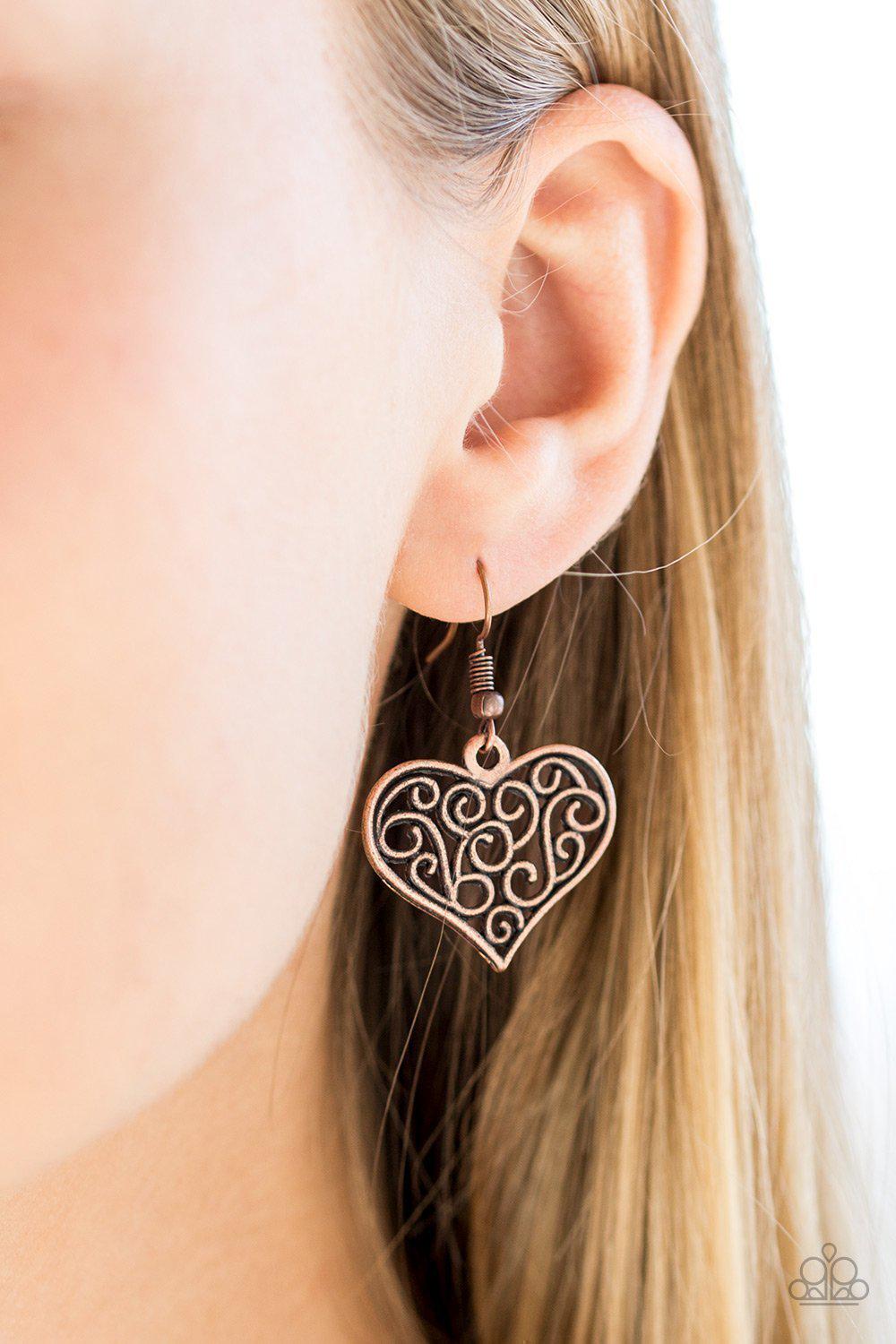 Heart-Touching Harmony Short Copper Heart Necklace and matching Earrings - Paparazzi Accessories- on model - CarasShop.com - Paparazzi Jewelry by Cara Jewels
