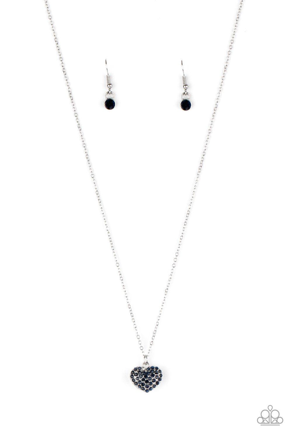 Heart-Warming Glow Blue Rhinestone Heart Necklace - Paparazzi Accessories- on model - CarasShop.com - Paparazzi Jewelry by Cara Jewels
