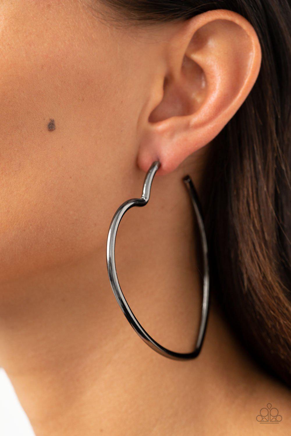 Heartbreaker Hustle Black Gunmetal Heart-shaped Hoop Earrings - Paparazzi Accessories- lightbox - CarasShop.com - Paparazzi Jewelry by Cara Jewels