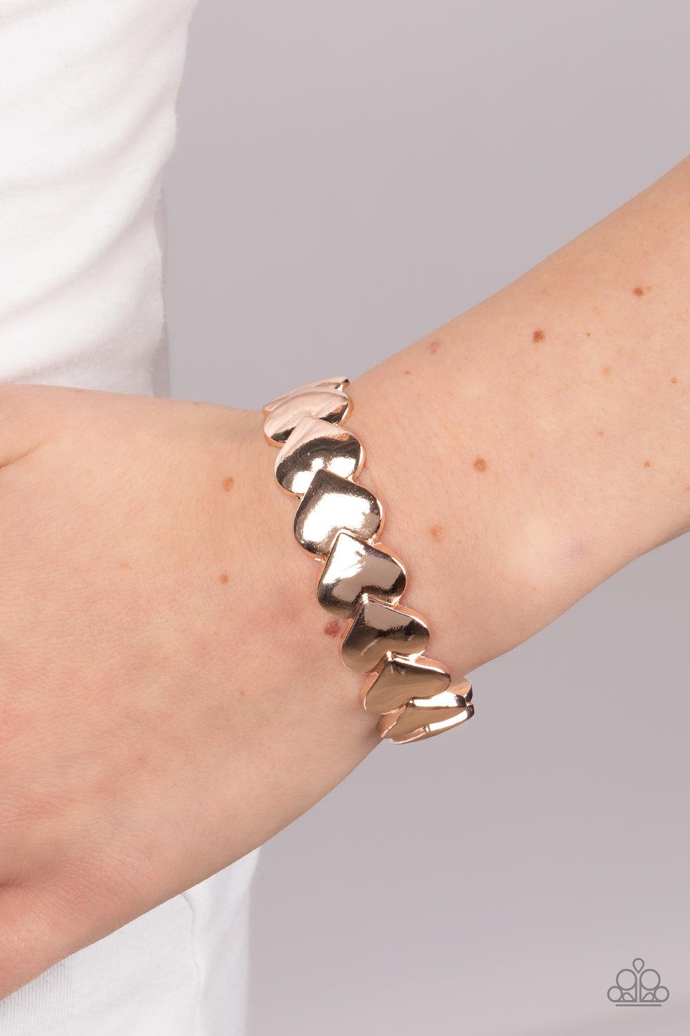 Hearts Galore Rose Gold Cuff Bracelet - Paparazzi Accessories- on model - CarasShop.com - Paparazzi Jewelry by Cara Jewels