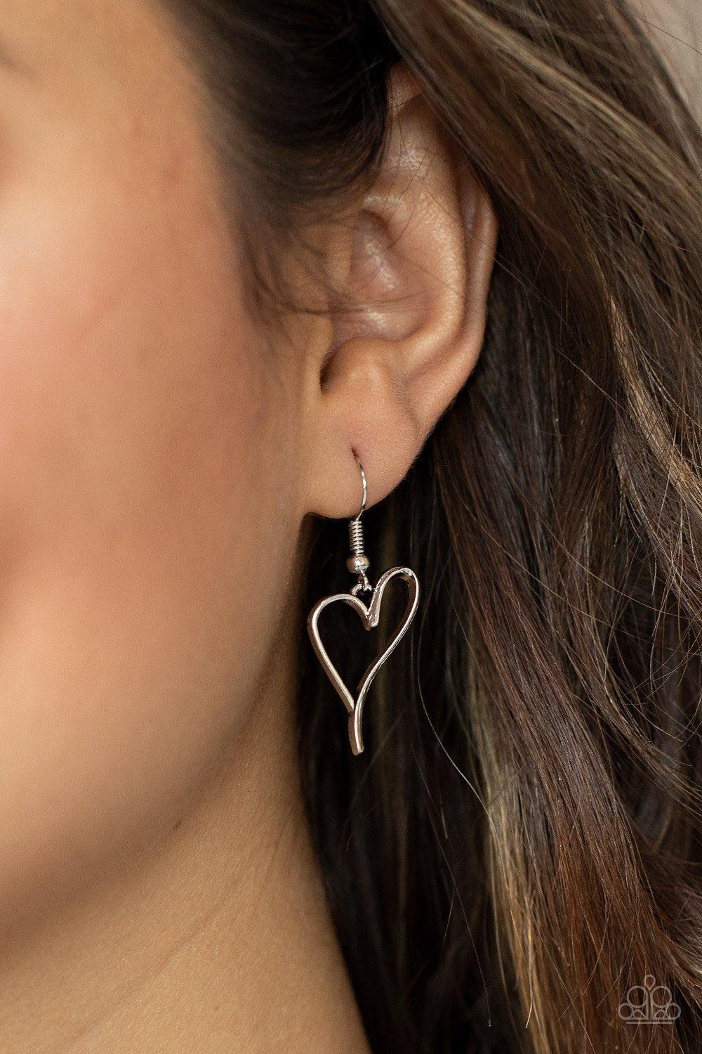 HEARTS So Good Silver Heart Necklace - Paparazzi Accessories- on model - CarasShop.com - Paparazzi Jewelry by Cara Jewels