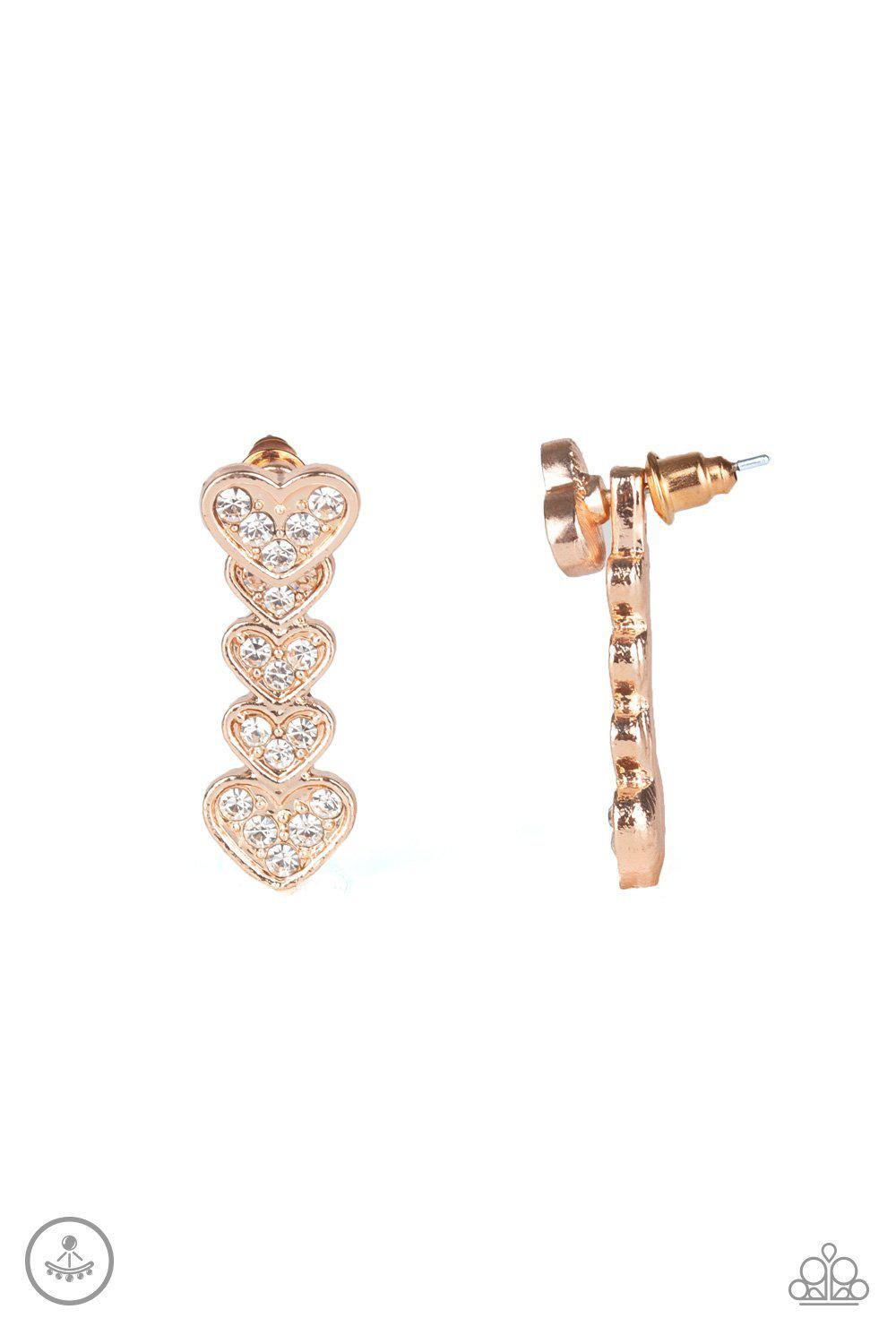 Heartthrob Twinkle Rose Gold Double-sided post Earrings - Paparazzi Accessories- on model - CarasShop.com - Paparazzi Jewelry by Cara Jewels