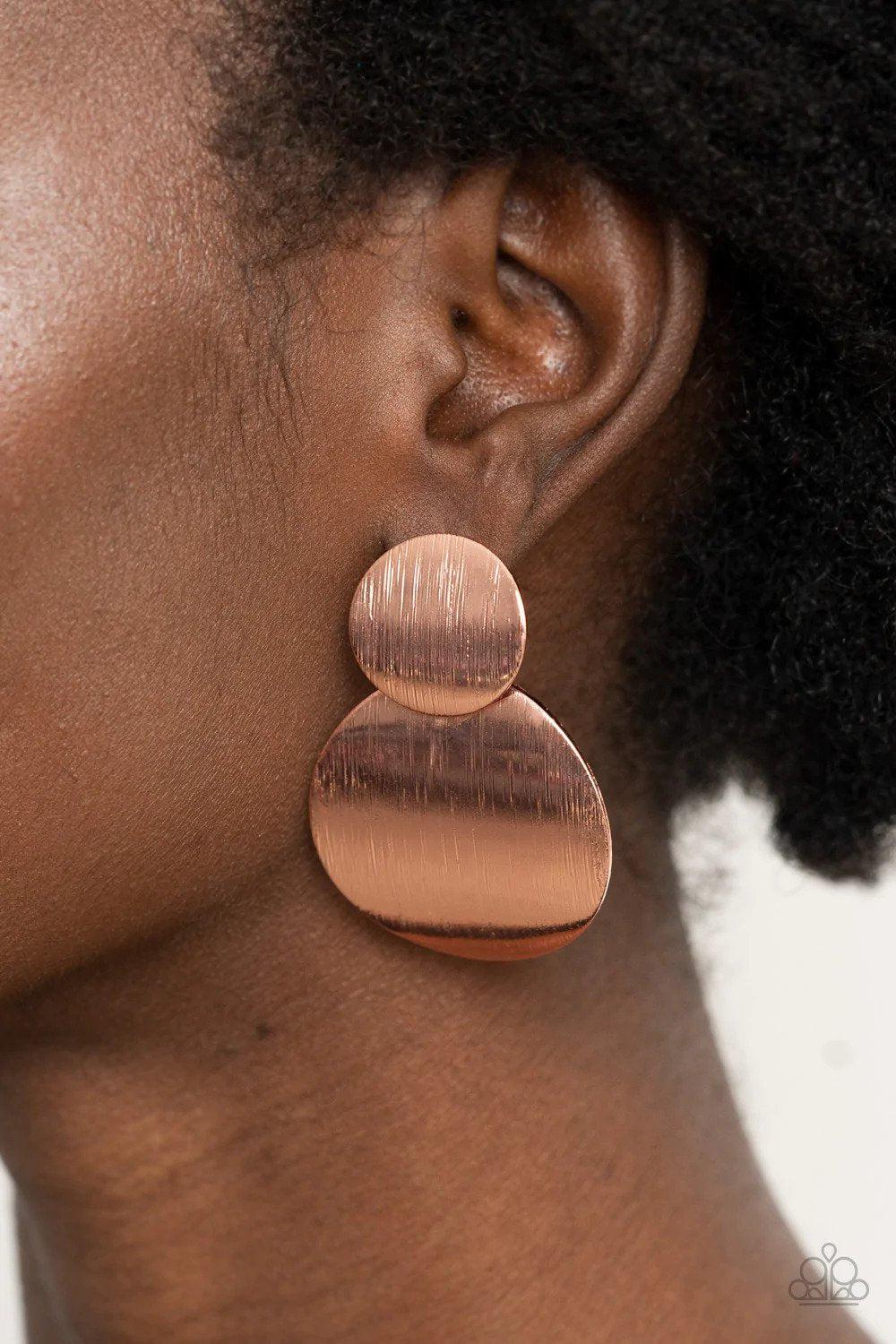 Here Today, GONG Tomorrow Copper Earrings - Paparazzi Accessories- on model - CarasShop.com - Paparazzi Jewelry by Cara Jewels