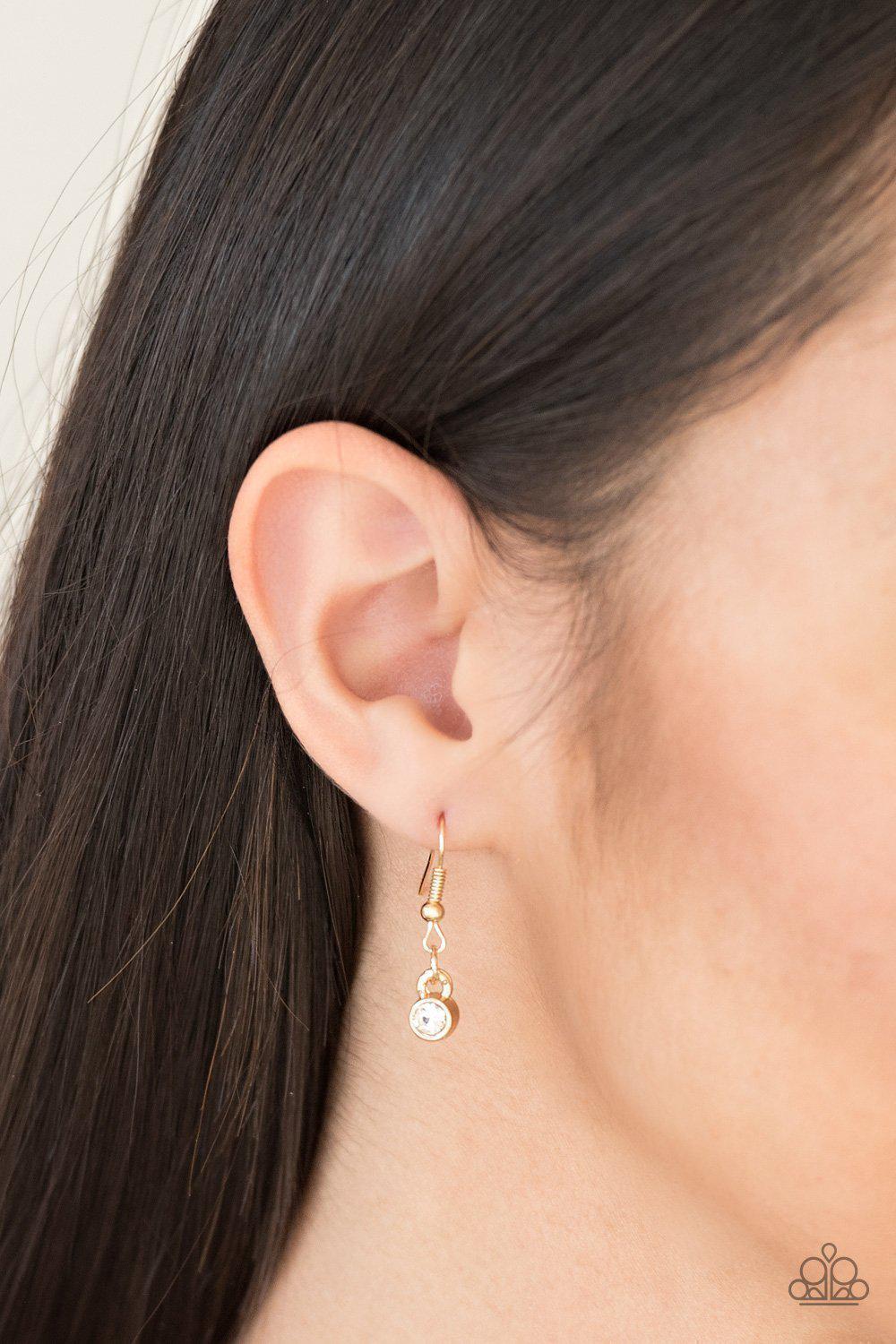 Here We Glow Gold and White Rhinestone Necklace - Paparazzi Accessories - free matching earrings -CarasShop.com - Paparazzi Jewelry by Cara Jewels