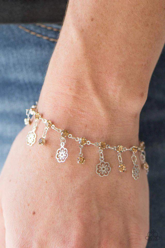 Hibiscus Breeze Brown Rhinestone Bracelet - Paparazzi Accessories- on model - CarasShop.com - Paparazzi Jewelry by Cara Jewels