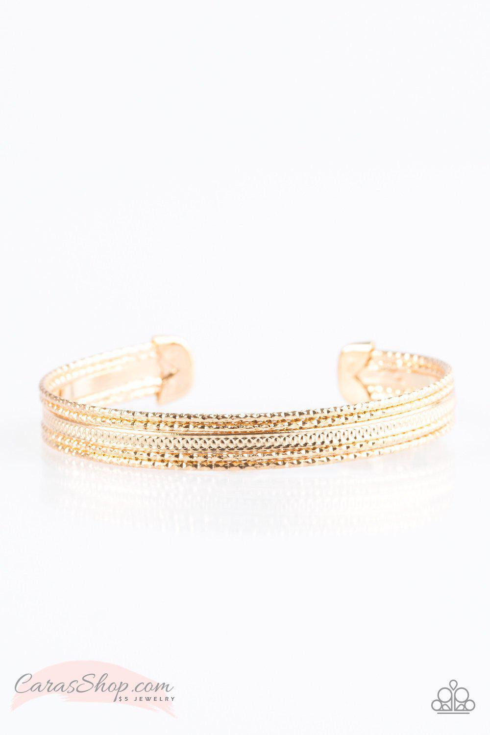 High Fashion Gold Cuff Bracelet - Paparazzi Accessories- on model - CarasShop.com - Paparazzi Jewelry by Cara Jewels
