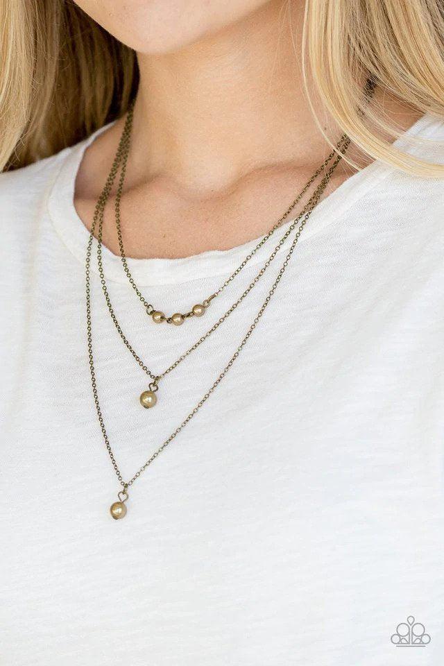 High Heels and Hustle Brass Necklace - Paparazzi Accessories- on model - CarasShop.com - Paparazzi Jewelry by Cara Jewels