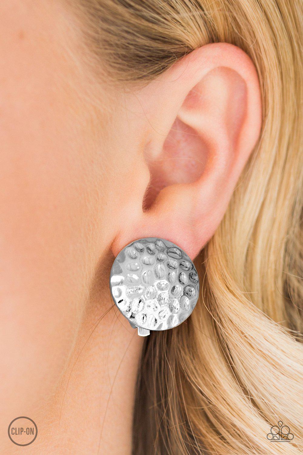 Hold The SHINE Hammered Silver Clip-on Earrings - Paparazzi Accessories- on model - CarasShop.com - Paparazzi Jewelry by Cara Jewels