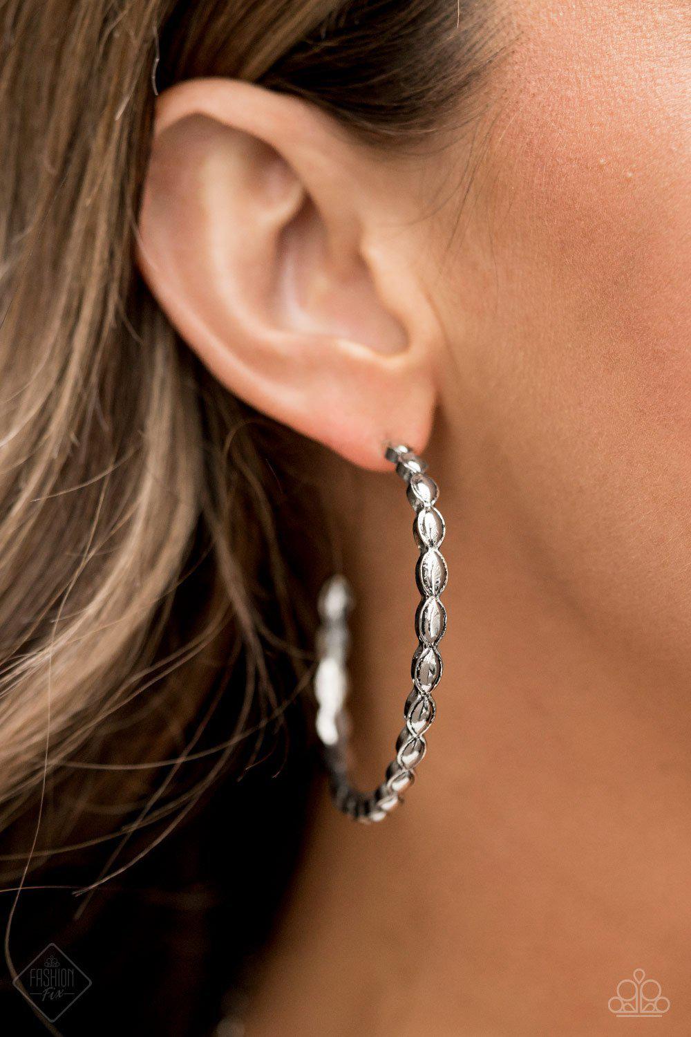 Hoop Hype Silver Hoop Earrings - Paparazzi Accessories- on model - CarasShop.com - Paparazzi Jewelry by Cara Jewels