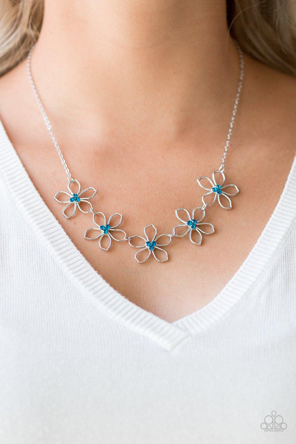 Hoppin' Hibiscus Blue Rhinestone and Silver Flower Necklace - Paparazzi Accessories- on model - CarasShop.com - Paparazzi Jewelry by Cara Jewels