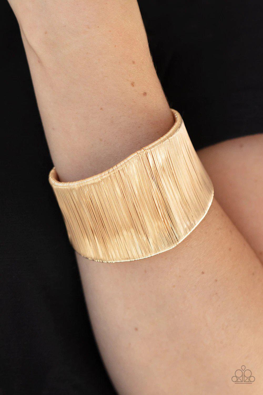 Hot Wired Wonder Gold Bracelet - Paparazzi Accessories- on model - CarasShop.com - Paparazzi Jewelry by Cara Jewels