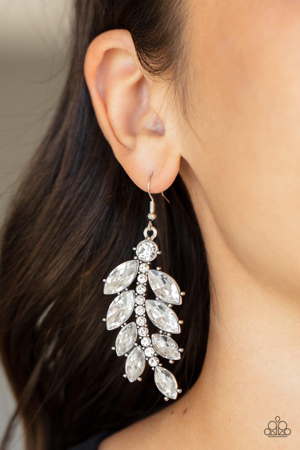 Ice Garden Gala White Rhinestone Leaf Earrings - Paparazzi Accessories- on model - CarasShop.com - Paparazzi Jewelry by Cara Jewels