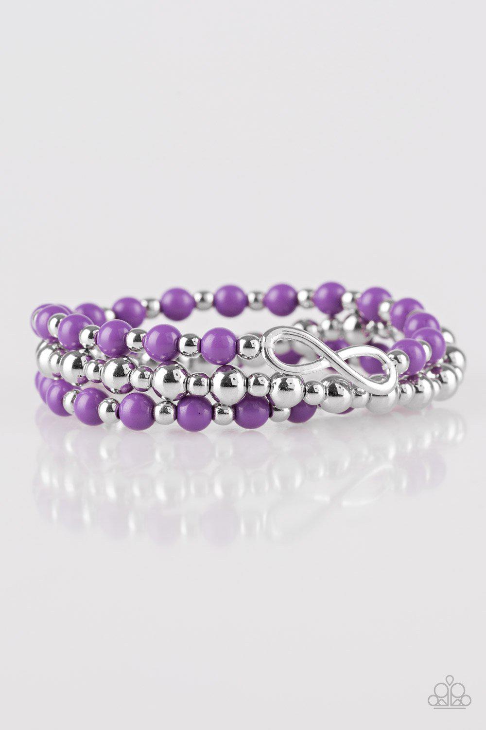 Immeasurably Infinite Silver and Purple Stretch Bracelet Set - Paparazzi Accessories- on model - CarasShop.com - Paparazzi Jewelry by Cara Jewels