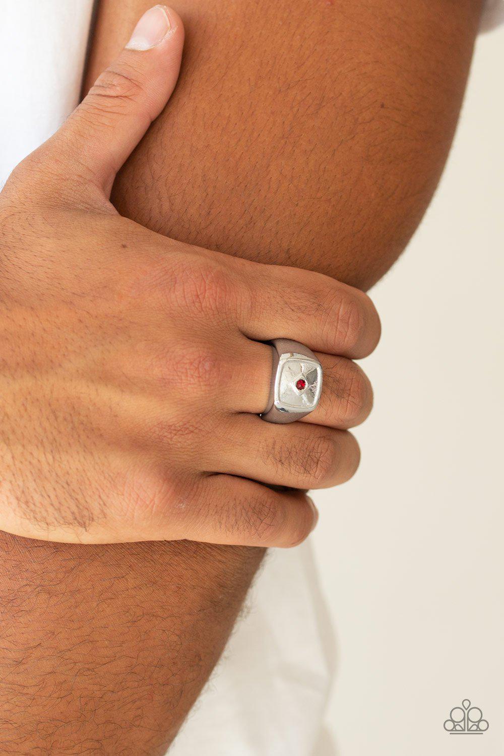 Immortal Men's Red Rhinestone and Silver Ring - Paparazzi Accessories- on model - CarasShop.com - Paparazzi Jewelry by Cara Jewels