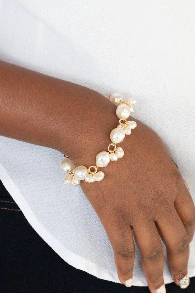 Imperfectly Perfect Gold Bracelet - Paparazzi Accessories- on model - CarasShop.com - Paparazzi Jewelry by Cara Jewels