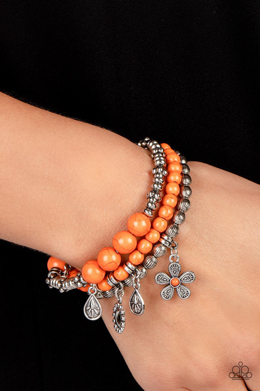 Individual Inflorescence Orange Bracelet - Paparazzi Accessories- on model - CarasShop.com - Paparazzi Jewelry by Cara Jewels