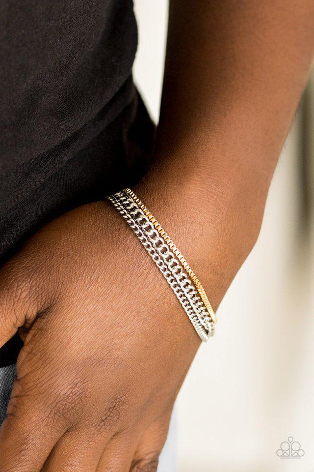 Industrial Icon Silver & Gold Bracelet - Paparazzi Accessories- on model - CarasShop.com - Paparazzi Jewelry by Cara Jewels