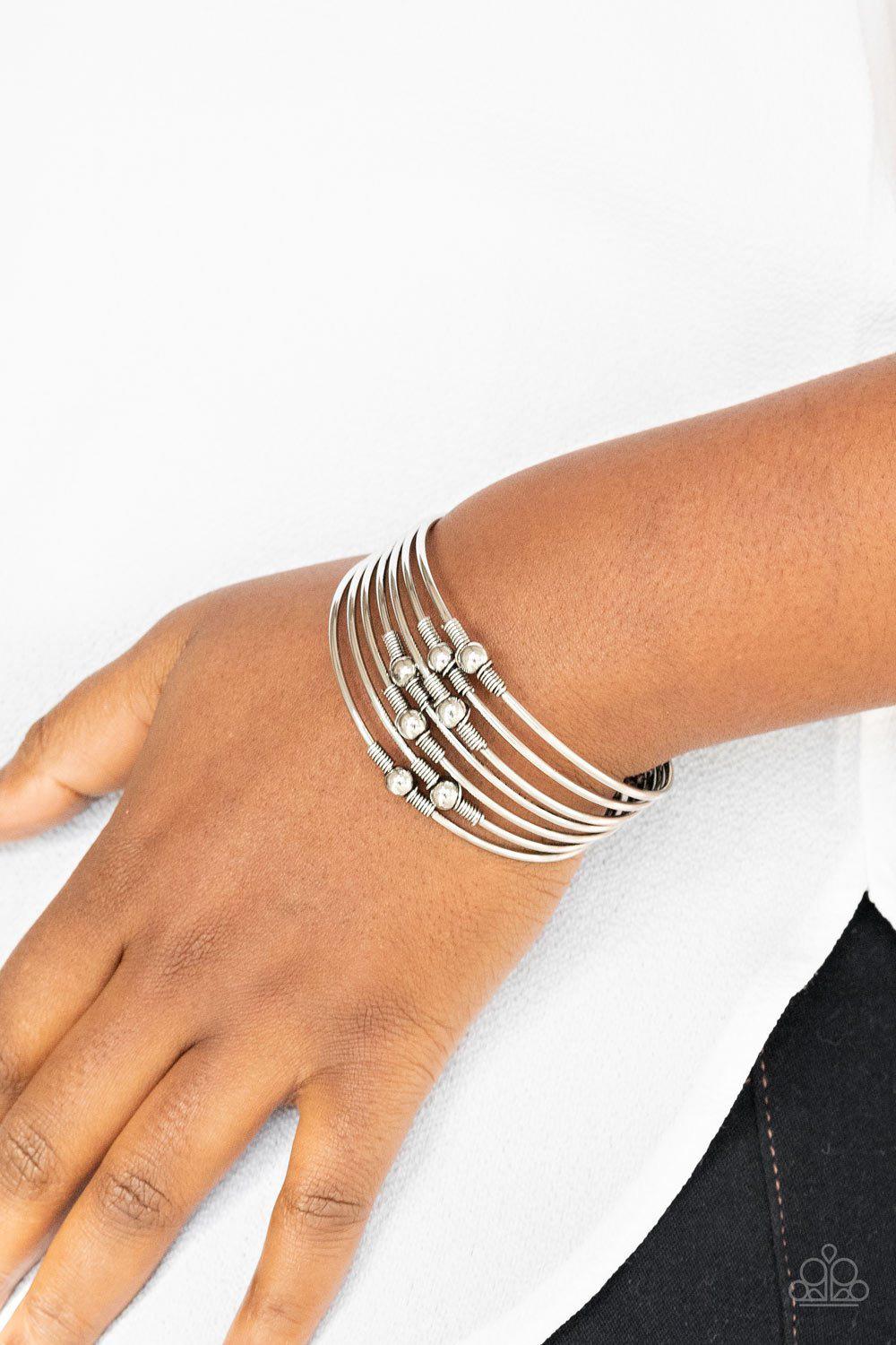 Industrial Intricacies Silver Cuff Bracelet - Paparazzi Accessories- on model - CarasShop.com - Paparazzi Jewelry by Cara Jewels
