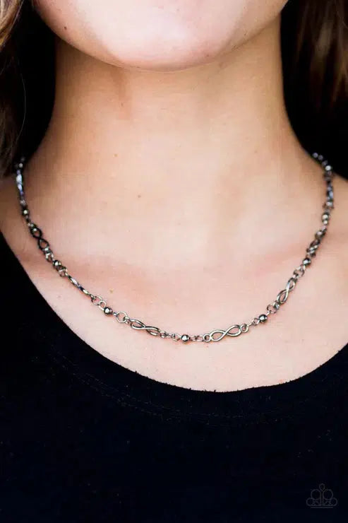 Infinite Beauty Gunmetal Black Necklace - Paparazzi Accessories- on model - CarasShop.com - Paparazzi Jewelry by Cara Jewels