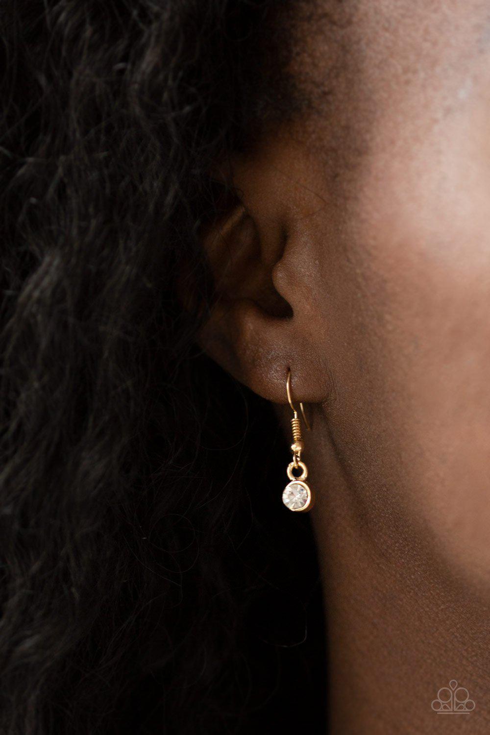 Inner Beauty Gold and White Rhinestone Necklace - Paparazzi Accessories- on model - CarasShop.com - Paparazzi Jewelry by Cara Jewels