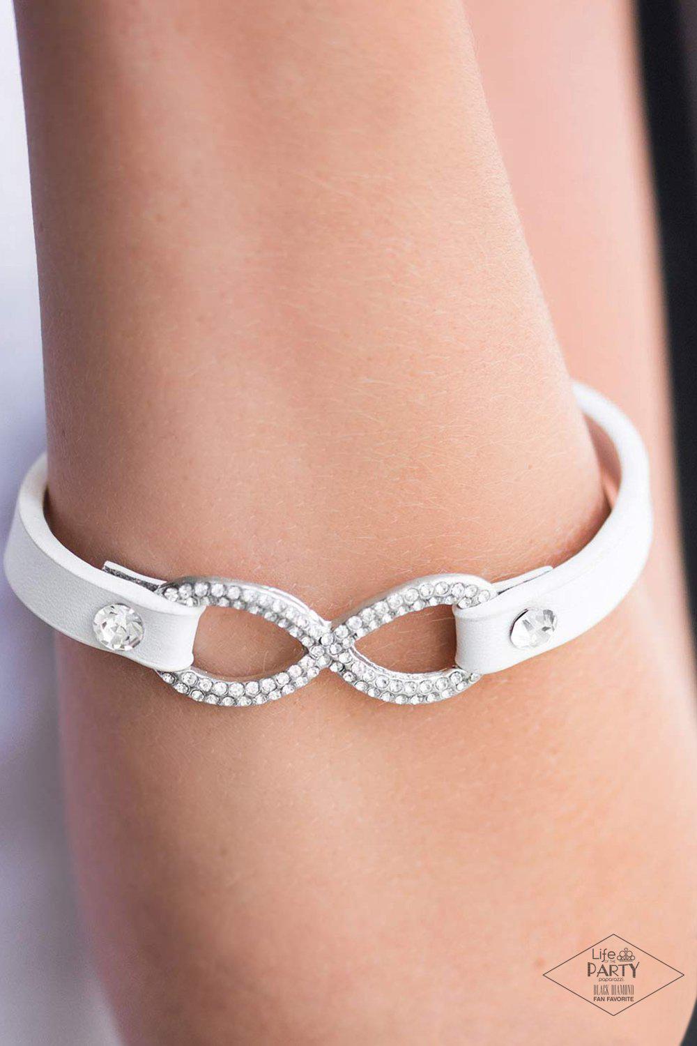 Innocent Till Proven GLITZY! White Leather Infinity Wrap Snap Bracelet - Paparazzi Accessories- lightbox - CarasShop.com - Paparazzi Jewelry by Cara Jewels