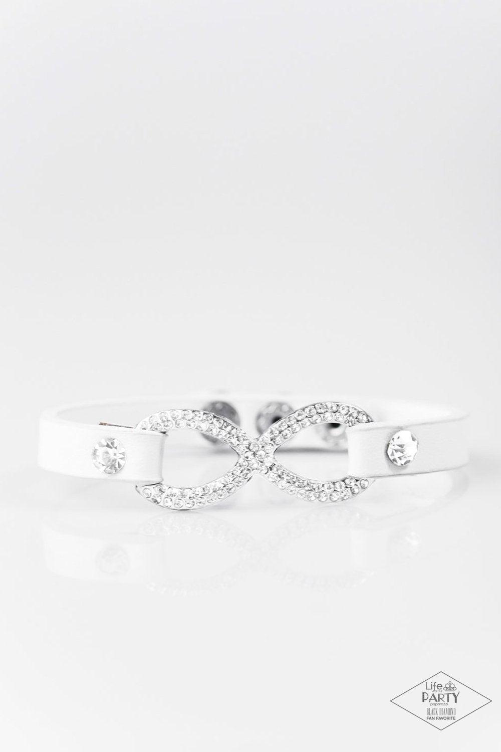 Innocent Till Proven GLITZY! White Leather Infinity Wrap Snap Bracelet - Paparazzi Accessories- on model - CarasShop.com - Paparazzi Jewelry by Cara Jewels