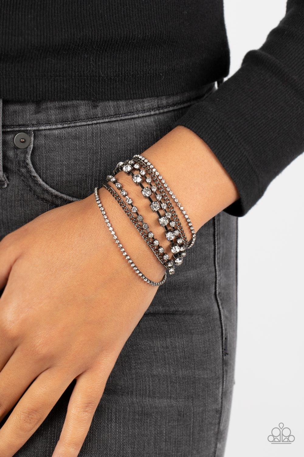 Interstellar Interlude Gunmetal Black & White Rhinestone Chain Bracelet - Paparazzi Accessories- on model - CarasShop.com - Paparazzi Jewelry by Cara Jewels