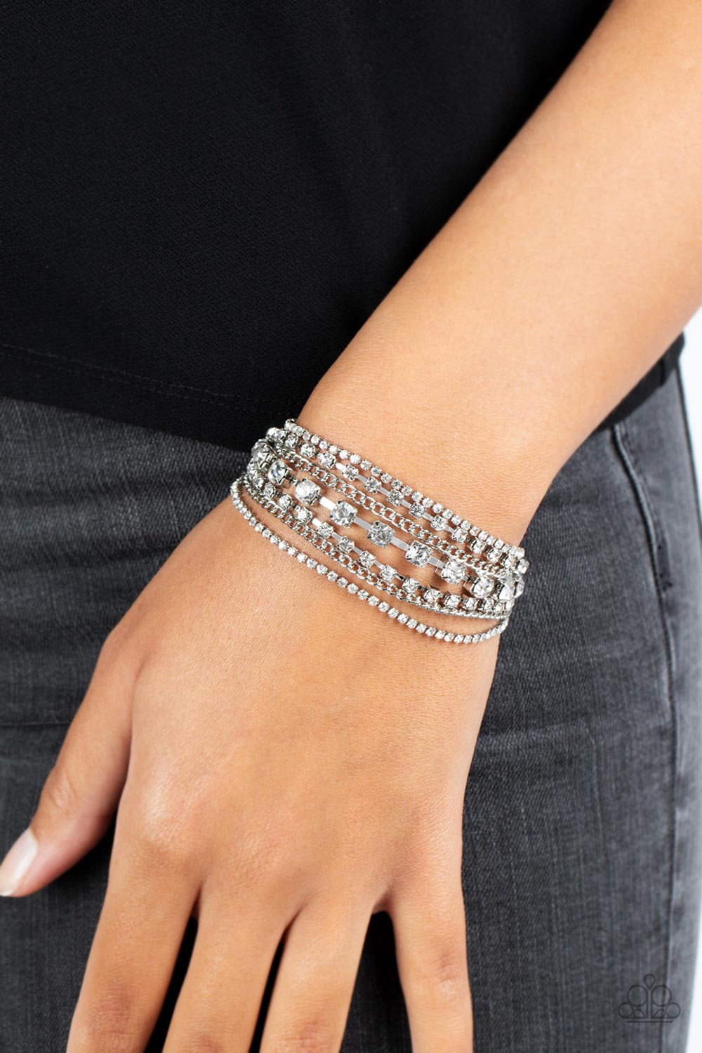 Interstellar Interlude White Rhinestone & Silver Bracelet - Paparazzi Accessories- on model - CarasShop.com - Paparazzi Jewelry by Cara Jewels