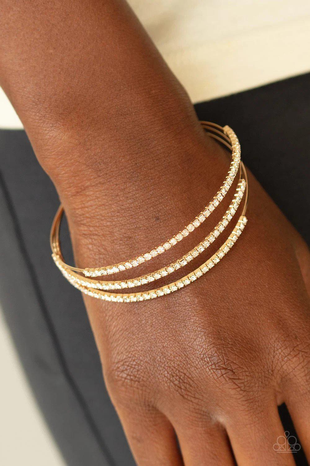 Iridescently Infatuated Gold and White Rhinestone Cuff Bracelet - Paparazzi Accessories- lightbox - CarasShop.com - Paparazzi Jewelry by Cara Jewels