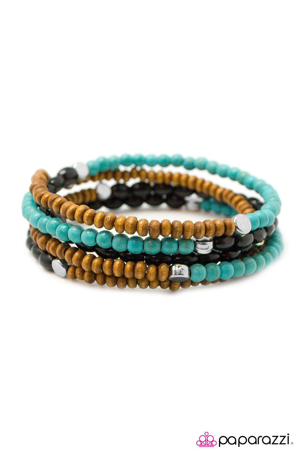 It's Human Nature Turquoise Blue, Black and Wood Wire Wrap Bracelet - Paparazzi Accessories- on model - CarasShop.com - Paparazzi Jewelry by Cara Jewels