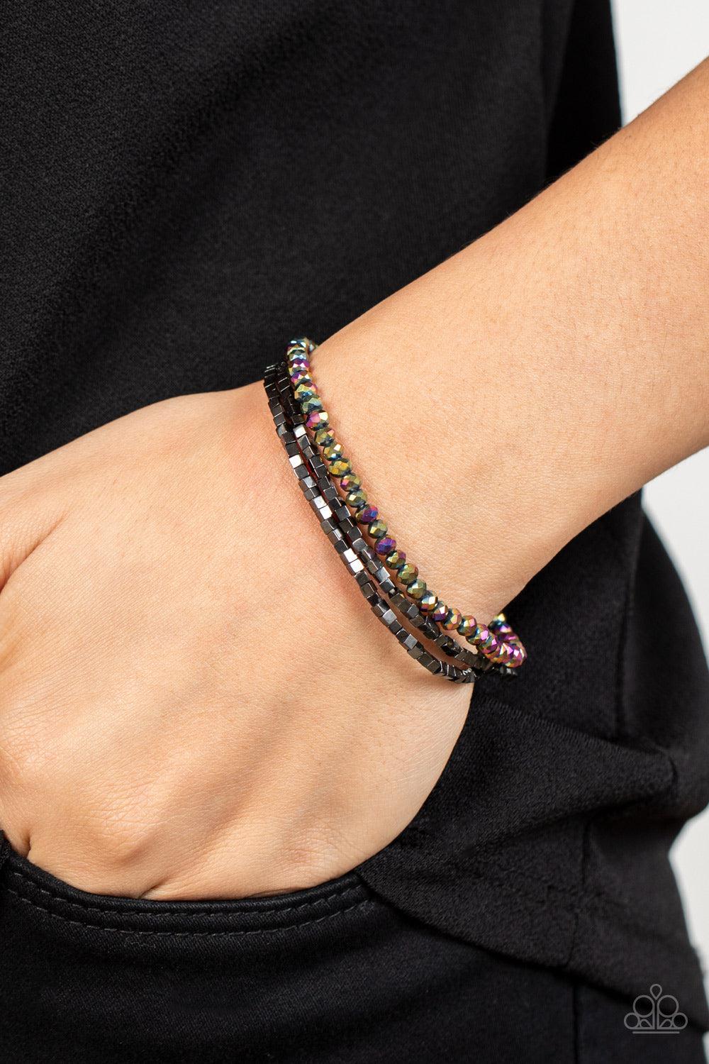 Just a Spritz Multi Oil Spill Bracelet Set - Paparazzi Accessories- on model - CarasShop.com - Paparazzi Jewelry by Cara Jewels
