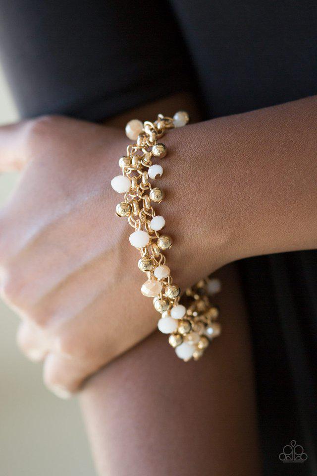 Just for the Fund of It Gold and White Bracelet - Paparazzi Accessories- on model - CarasShop.com - Paparazzi Jewelry by Cara Jewels