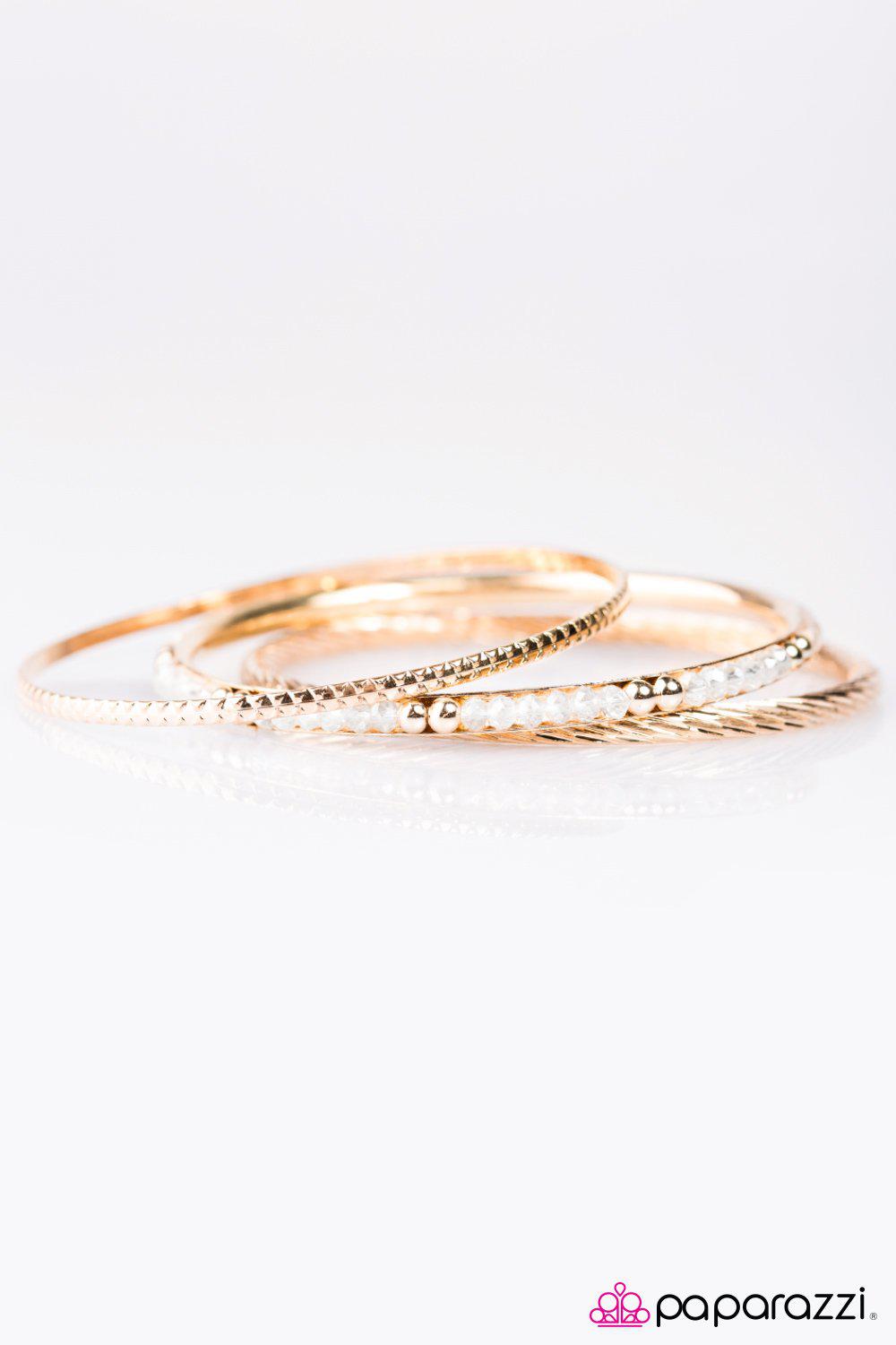 Just Stay GLAM! Gold Bangle Bracelet Set - Paparazzi Accessories- on model - CarasShop.com - Paparazzi Jewelry by Cara Jewels
