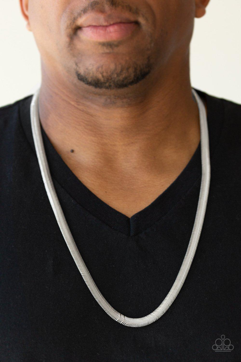 Kingpin Men's Silver Herringbone Chain Necklace - Paparazzi Accessories- on model - CarasShop.com - Paparazzi Jewelry by Cara Jewels