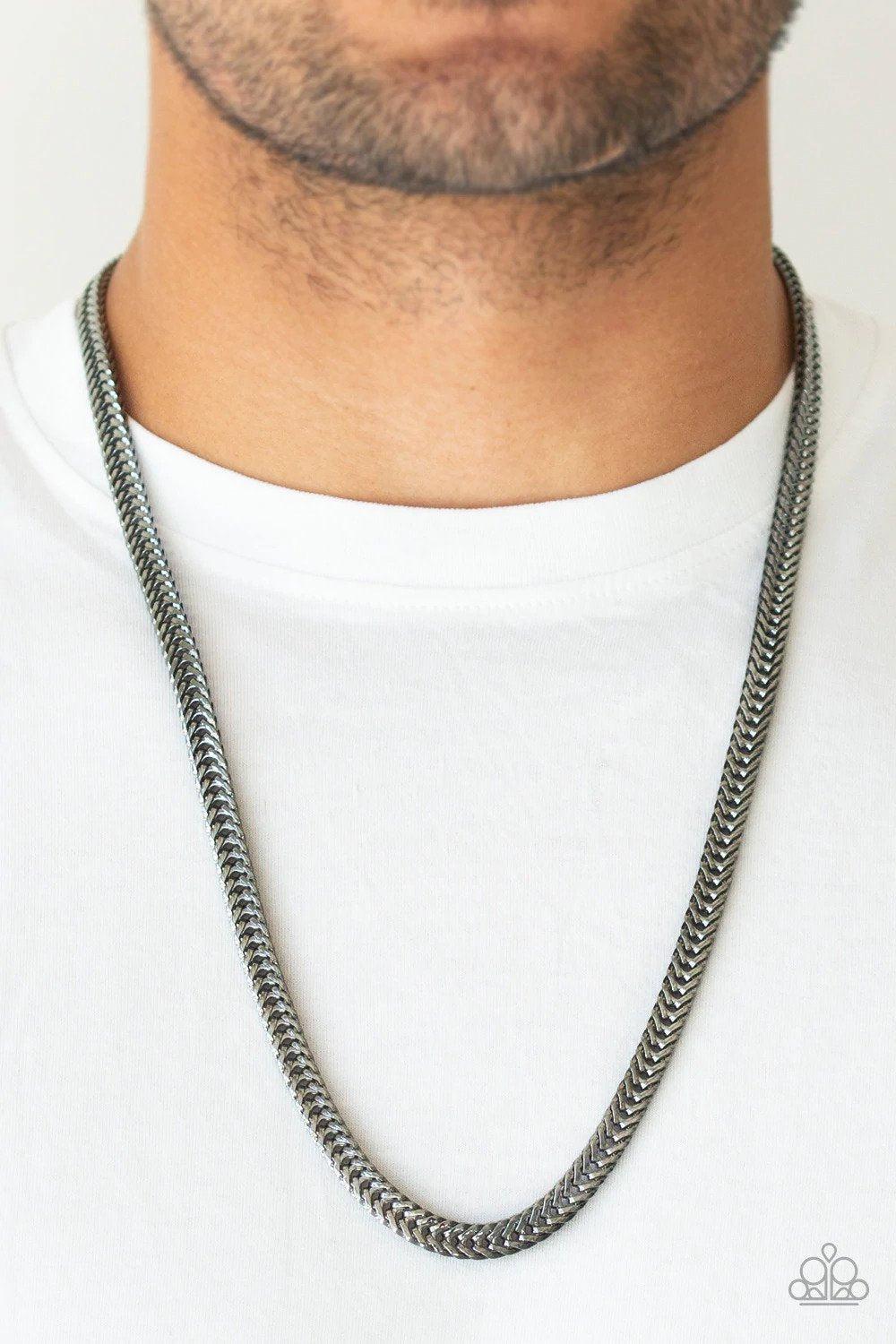 Knockout King Men's Gunmetal Black Necklace - Paparazzi Accessories- on model - CarasShop.com - Paparazzi Jewelry by Cara Jewels