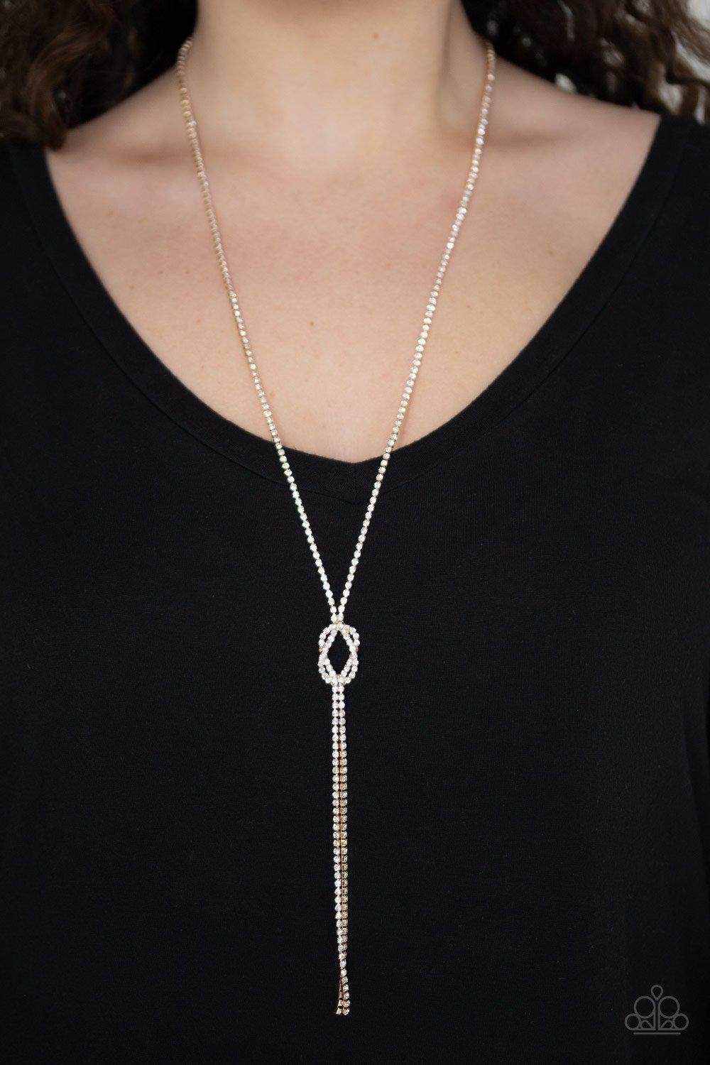 Knockout Knot Gold and White Rhinestone Necklace - Paparazzi Accessories- lightbox - CarasShop.com - Paparazzi Jewelry by Cara Jewels