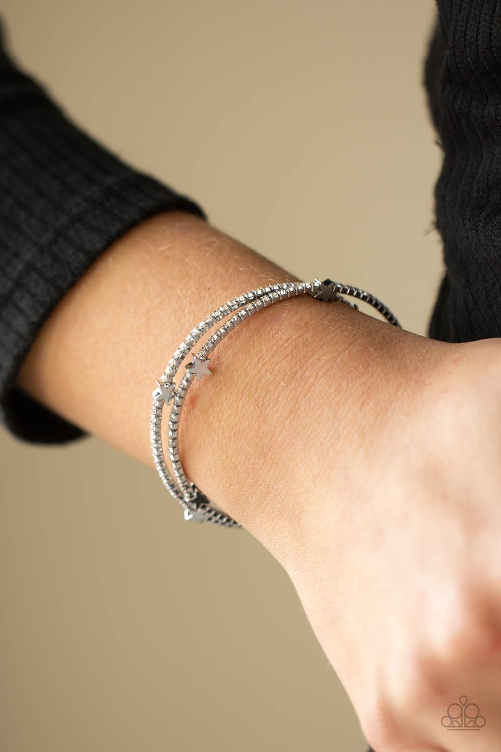 Let Freedom BLING White Rhinestone and Silver Star Bracelet - Paparazzi Accessories- on model - CarasShop.com - Paparazzi Jewelry by Cara Jewels