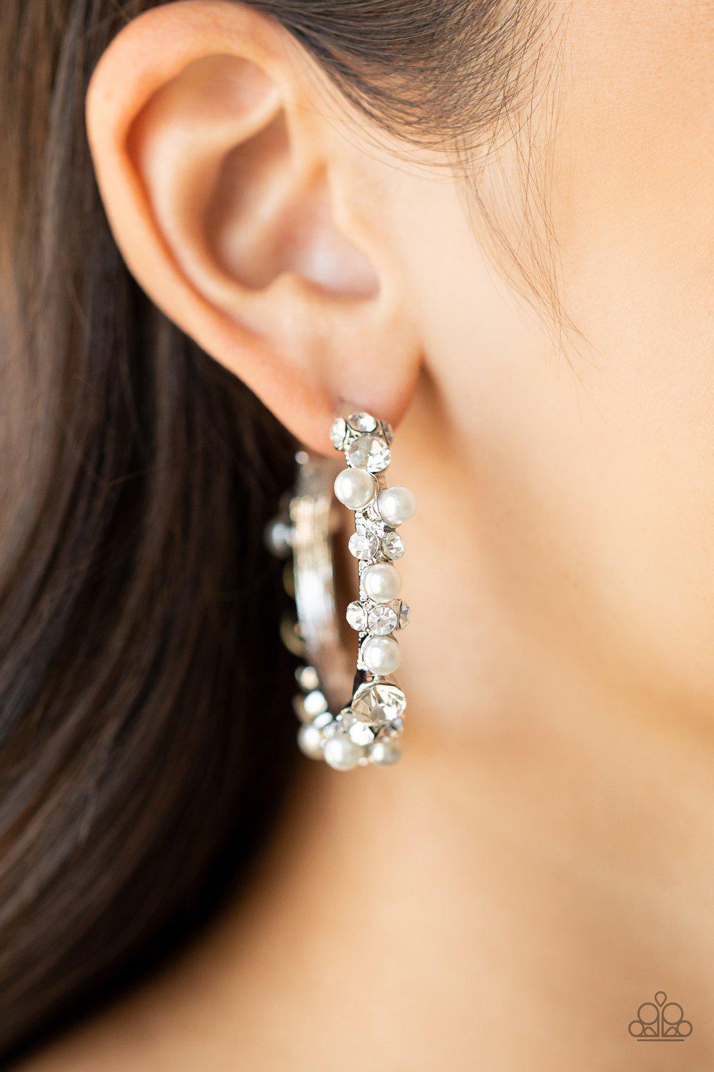 Let There Be SOCIALITE White Pearl and Rhinestone Hoop Earrings - Paparazzi Accessories- on model - CarasShop.com - Paparazzi Jewelry by Cara Jewels